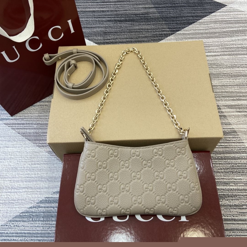 G*u*i top handle bags